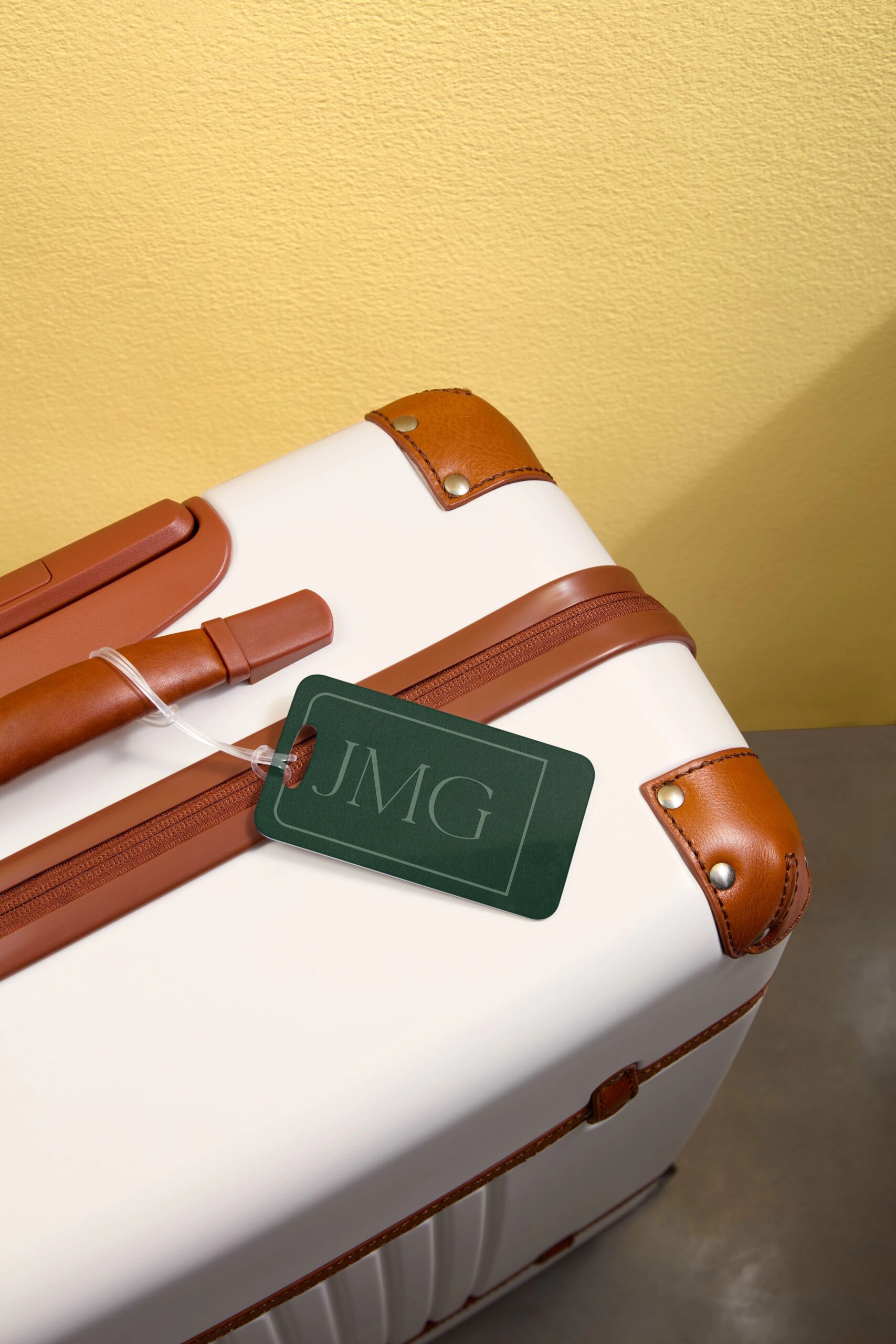 monogrammed luggage tag on suitcase